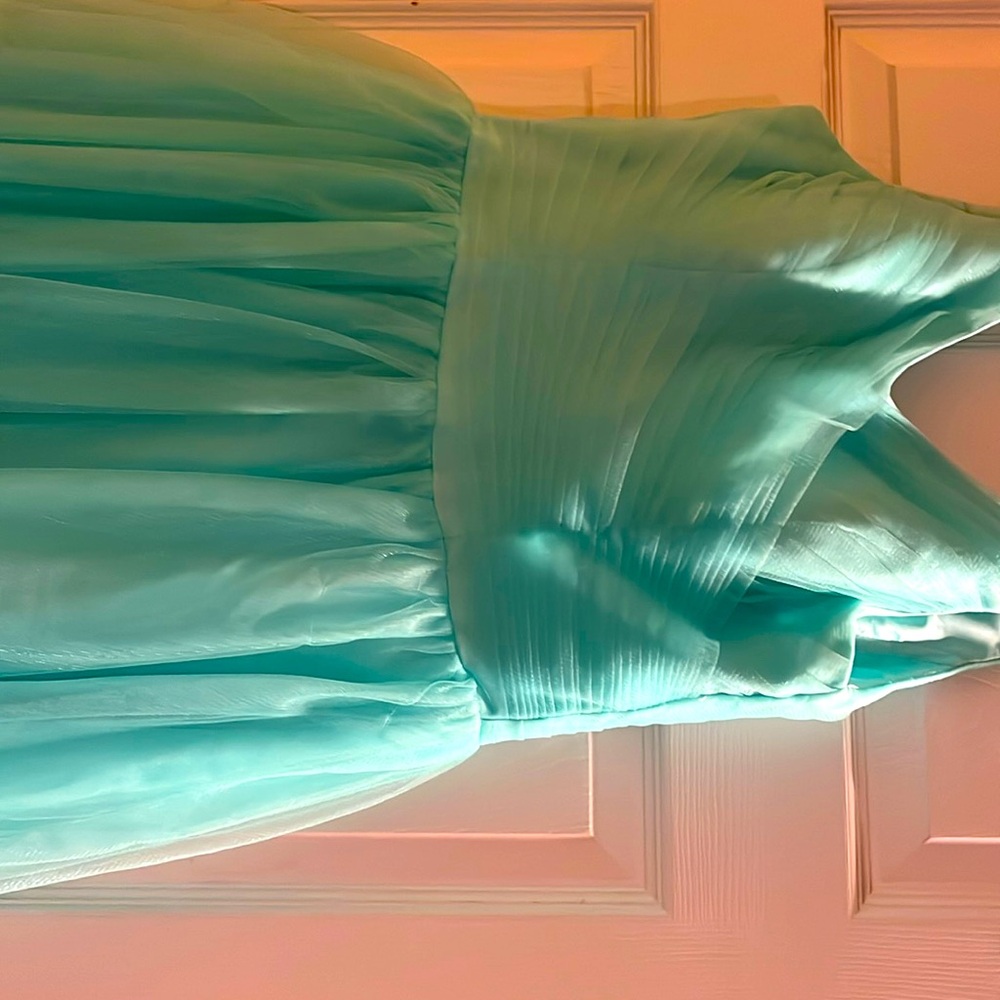 Bridesmaids dress, mint green with a tie up back. Worn once. Size 6